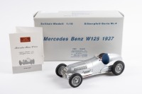 MERCEDES-BENZ: A highly detailed CMC 1:18 scale 1937 Mercedes-Benz W125 (M-031) in silver paintwork in original box