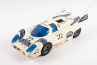 PORSCHE 917K MARTINI: A battery operated plastic Porsche 917K remote control car, a replica of the 1971 Le Mans winning Martini racing Porsche, made by Asahi corporation in Japan