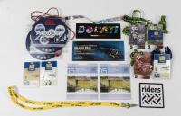 PIT PASSES: A collection of pit passes and various items for motorcycling events