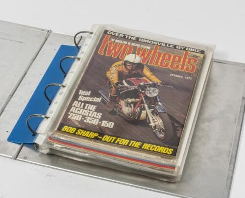 MOTORCYCLE LITERATURE: A folder containing various motorcycle publications and literature