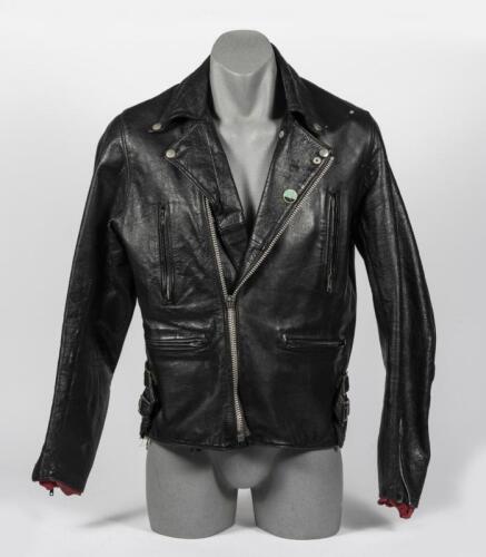 MOTORCYCLE LEATHERS: A heavy black motor cycle leather jacket
