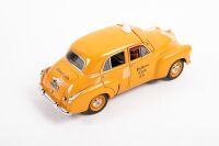 HOLDEN FJ: A 1:24th scale Trax Holden FJ special sedan model, this FJ model is finished in orange paintwork, bearing the Yellow Cab co livery, limited edition - 3