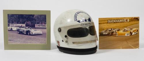 RACE WORN HELMET: A white 1975 Bell race-worn helmet as worn by Neil Crang