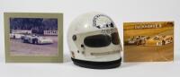 RACE WORN HELMET: A white 1975 Bell race-worn helmet as worn by Neil Crang