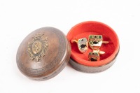 MCLAREN: A set of late c1960s McLaren racing team cufflinks and tie pin, as gifted to Paul Higgins by Bruce McLaren