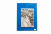 BATHURST 82/83: A hardcover James Hardie 1000 1982/83 yearbook by Bill Tuckey, signed to inside cover page by Peter Brock and personally signed and inscribed by Bill Tuckey - 5