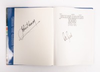 BATHURST 83/84: A hardcover James Hardie 1000 1983/84&nbsp;yearbook by Bill Tuckey, signed to inside cover page by Peter Brock and John Harvey, along with personal inscription and signature by author Bill Tuckey - 2