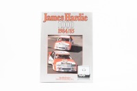 BATHURST 84/85: A hardcover James Hardie 1000 1984/85&nbsp;yearbook by Bill Tuckey, signed to inside cover page by Peter Brock