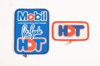 HDT: Two original late 1980s HDT cloth badges for Mobil HDT, largest 10cm high