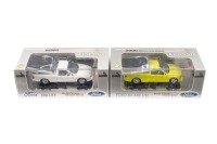 FORD: Two Classic Carlectables 1:43 scale models of the 2002 XR8 Ute in Winter White and a 2003 BA XR8 Ute in Citric Acid, both boxed