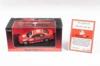 HOLDEN: A 1:43 scale model by Autoart of the Holden Monaro CV8 driven by Peter Brock and navigated by James Brock in the 2002 Targa Tasmania, limited edition 1987/5000 complete with certificate of authenticity and original packaging