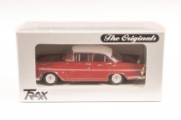 HOLDEN: A 1:43 scale model by Trax of the Holden EK in red/white, complete with original packaging