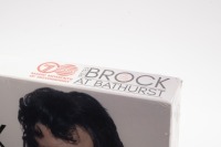 PETER BROCK: A collection of DVDs featuring Brock&rsquo;s Early Years at Bathurst by Chevron. Four discs, still in original box unopened - 2