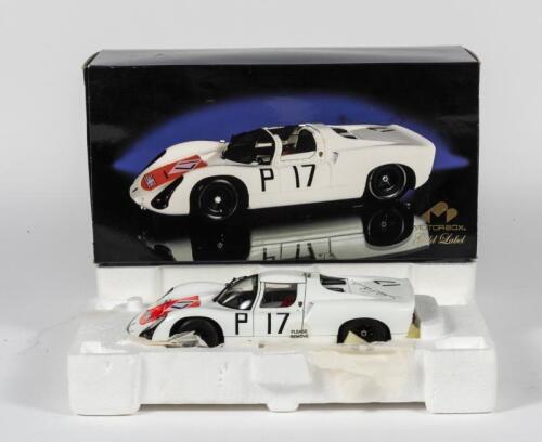 PORSCHE: A 1:18 scale Porsche 910 by Exoto Motorbox Gold Label. Model signed by Alan Hamilton