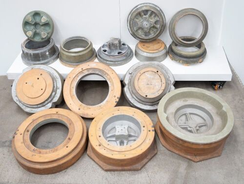 A collection of 'wobbly' wheel molds made by Denis for Brabham cars and believed suitable for Lotus or Lola