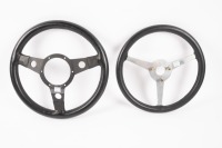 STEERING WHEELS: Two leather bound three spoke racing steering wheels - 2