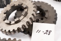 HEWLAND: A box labelled 'Hewland Mk5', contains gear parts of varying sizes - 4