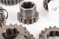 HEWLAND: A box labelled 'Hewland Mk5', contains gear parts of varying sizes - 8