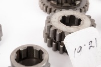 HEWLAND: A box labelled 'Hewland Mk5', contains gear parts of varying sizes - 9