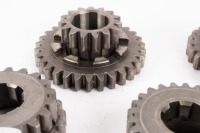 HEWLAND: A box labelled 'Hewland Mk5', contains gear parts of varying sizes - 10