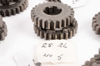 HEWLAND: A box labelled 'Hewland Mk5', contains gear parts of varying sizes - 11