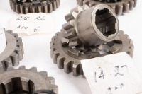 HEWLAND: A box labelled 'Hewland Mk5', contains gear parts of varying sizes - 14