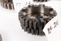 HEWLAND: A box labelled 'Hewland Mk5', contains gear parts of varying sizes - 16