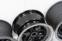 RACING WHEELS: Three 'wobbly' racing wheels to suit Brabham, two are nine inch width and one is eight inch width - 5