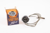 SMITHS: Two small Smiths gauges, includes a NOS oil pressure gauge and a oil pressure / water temperature gauge, both 5.5cm in diameter