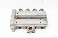 LOTUS: A Lotus twin cam engine head with cam covers, stamped with numbers 'EU4 68022025'
