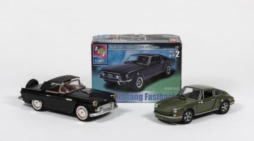 MODELS: Three interesting models cars. Porsche, Thunderbird, Mustang models