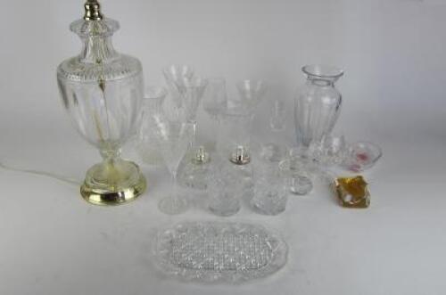 GLASSWARE: A large collection of various glassware