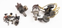 DISTRIBUTORS: Two Bosch four cylinder racing distributors with plug ends and loose fittings