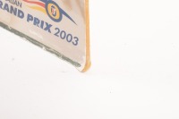 JACK BRABHAM: A poster mounted on board signed by Sir Jack promoting the 2003 Tattersall's Historic Demonstration, 59cm high, 42cm wide - 4