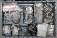 HEWLAND: A double sided plastic case containing Hewland gearbox spare parts and set-up parts, no gears - 2