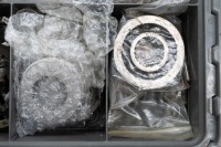 HEWLAND: A double sided plastic case containing Hewland gearbox spare parts and set-up parts, no gears - 9