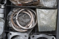 HEWLAND: A double sided plastic case containing Hewland gearbox spare parts and set-up parts, no gears - 14