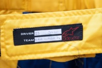 BAR HONDA: A BAR Honda racing suit, dated 2005, in 555 Tobacco blue & gold livery, made by Alpinestars, label marked 'Driver 23 54 LO - Team BAR Honda F1' - 6