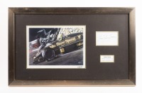 SENNA: A framed collage containing a print after the original airbrush painting by G.Willem Lubach titled 'Ayrton Senna - JPS Lotus 98T "86" along with Ayrton Senna signature on card mounted within frame. Measures 38.5cm high, 62.5cm wide