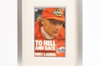 LAUDA: A framed and glazed collage featuring printed photographs related to Niki Lauda, middle photograph signed by Lauda. Measures 79cm high, 27cm wide overall - 2