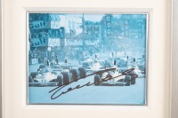 LAUDA: A framed and glazed collage featuring printed photographs related to Niki Lauda, middle photograph signed by Lauda. Measures 79cm high, 27cm wide overall - 4