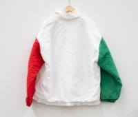 JACKET: A mens outer jacket from the 1996 Concours Italiana event, predominantly white with red & green sleeves, European size 24 [Location: Melbourne] - 3