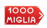 MILLE MIGLIA: A small reproduction enamel '1000 Miglia' directional sign, 15cm high, 30cm wide [Location: Melbourne]