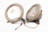 FIAT: A pair of circa 1920s or 1930s Fiat headlamps, made by Carello-Torino, with clear branded lenses, lens width 18cm [Location: Melbourne]