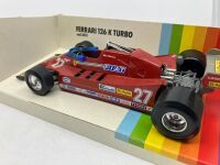 FERRARI 126K: A 1:24 scale model die-cast Burago 126K Turbo Formula One car, in original packaging [Location: Sydney] - 3
