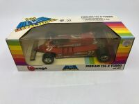 FERRARI 126K: A 1:24 scale model die-cast Burago 126K Turbo Formula One car, in original packaging [Location: Sydney] - 4