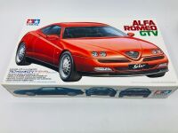 ALFA ROMEO: A 1:24 scale plastic kit by Tamiya of the GTV, Series No. 172 in Atoll Blue Metallic, in original packaging [Location: Sydney]