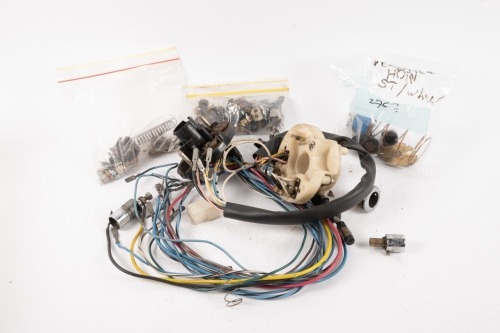 FERRARI SWITCHES: A tub of assorted Ferrari 1960s / 1970s indicator & dash switches & other associated parts [Location: Melbourne]