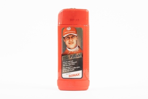 MICHAEL SCHUMACHER: A 250ml red container of Sonax Polish featuring Michael Schumacher on label [Location: Melbourne]