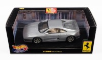 FERRARI F355: A Hot Wheels 1:18 scale model Ferrari F355 Berlinetta in silver paintwork in original box [Location: Melbourne]